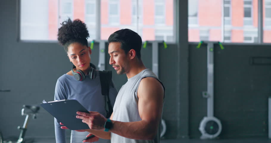 Gym subscription, personal trainer and client doing sign up for membership to exercise and train. Fitness coach talking training, workout plan and member registration at health and wellness club Royalty-Free Stock Footage #1101772243