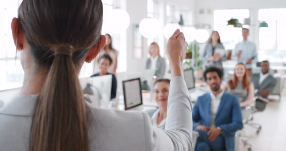 Applause, winner and wow with a female leader, manager or boss and team clapping in the office at work. Meeting, coaching and training with a business woman and colleague group applauding a goal Royalty-Free Stock Footage #1101772435