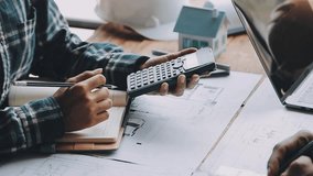 Construction and structure concept of engineer working drawing on blueprint meeting for project working with partner on model building and engineering tools in working site, construction concept - Powered by Shutterstock - Get 15% off with code: PIKWIZARD15