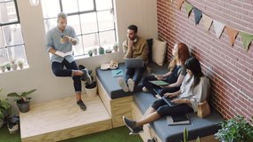 Teamwork, collaboration and tech students work on a project for a university, college or school research paper. Education, learning and student study group with info book working together on campus - Powered by Shutterstock - Get 15% off with code: PIKWIZARD15