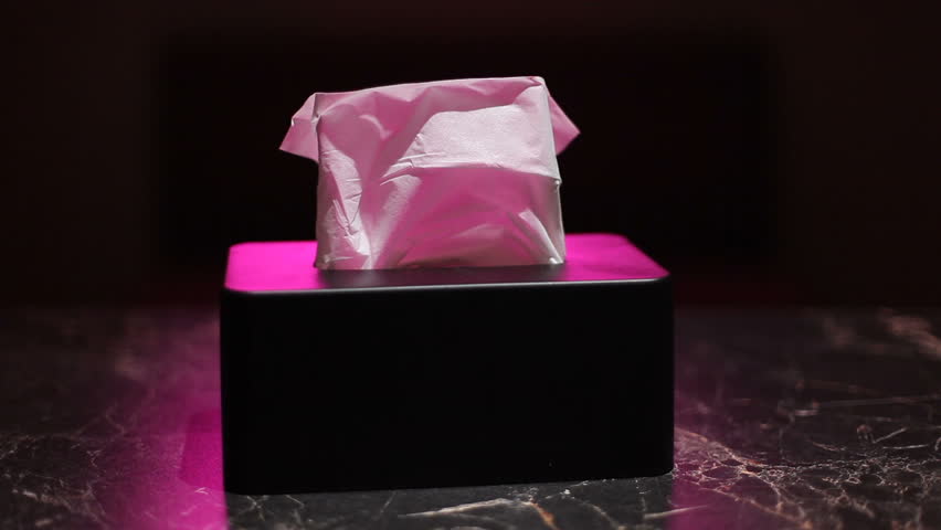 Dry wipes in a black box. A man in a bar takes a napkin from the table. | Shutterstock HD Video #1101791661
