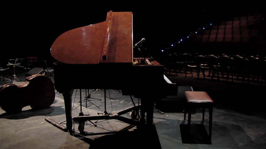 Grand Piano on Empty Stage with Microphone and Other Musical Instruments.   | Shutterstock HD Video #1101792367