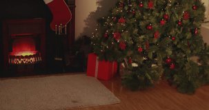 Animation of merry christmas text over santa claus with gifts and christmas tree. christmas, festivity and celebration concept digitally generated video.