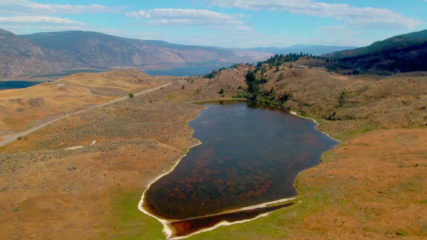 Aerial view of Spotted Lake in Osoyoos British Columbia Okanagan Valley on Hot Summer Day