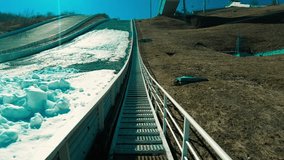 metal steps overgrown with grass on the stadium, motion view from bottom to top - Powered by Shutterstock - Get 15% off with code: PIKWIZARD15