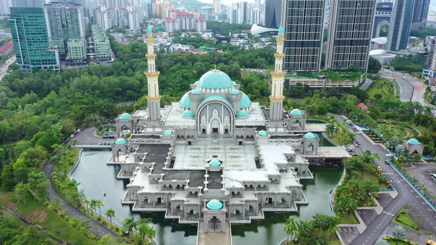Aerial view of the Federal Territory Mosque, also known as Masjid Wilayah Persekutuan in Kuala Lumpur, Malaysia Royalty-Free Stock Footage #1101802371
