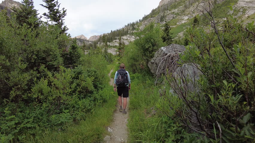 Following Male Hiker into Paintbrush Canyon in Grand Teton National Park