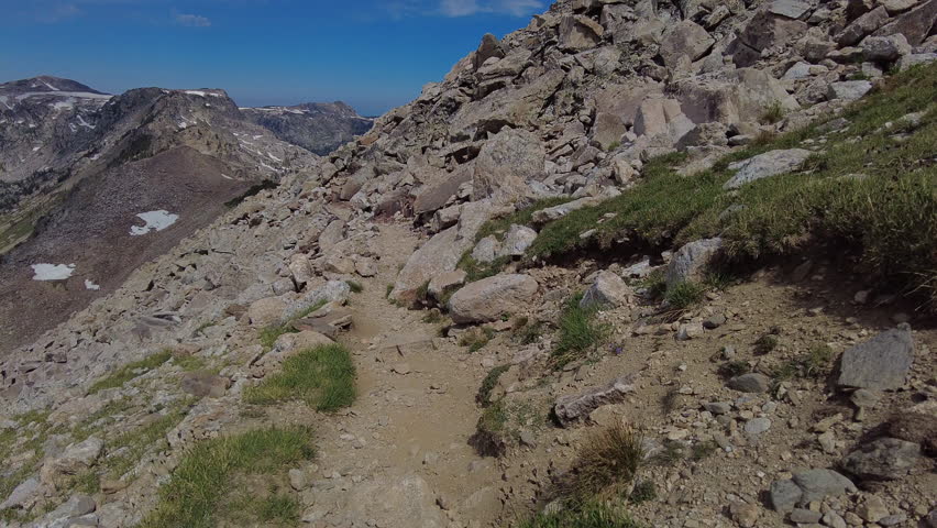 Hiking Rocky Trail down from Paintbrush Divide in Grand Teton National Park