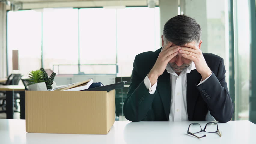 Senior employee sitting with dismissal box. Man by dismissal. Senior man lost job. Old man is retiring. Man office worker disappointed by dismissal. Discharge company employees, seniorlife | Shutterstock HD Video #1101812161