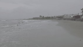 wintertime choppy sea, cloudy weather choppy sea, beachside in rough sea LOG VIDEO