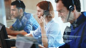 Animation of data processing over office workers wearing headsets. global communication data technology and digital security interface concept. - Powered by Shutterstock - Get 15% off with code: PIKWIZARD15