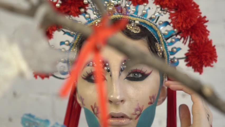 Slow Motion portrait of a japanese girl in a kimono