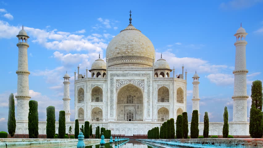 Time lapse of Taj Mahal, an ivory-white marble mausoleum on the south bank of the Yamuna river in Agra, Uttar Pradesh, India. One of the seven wonders of the world.