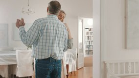 Retirement couple dancing in home with happiness for real estate investment or mortgage on their dream property house. Dance, love and happy marriage senior pension man and woman in their living room - Powered by Shutterstock - Get 15% off with code: PIKWIZARD15