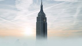 An aerial shot captured at sunrise of the Empire State Building in Midtown Manhattan, New York City, USA. - Powered by Shutterstock - Get 15% off with code: PIKWIZARD15