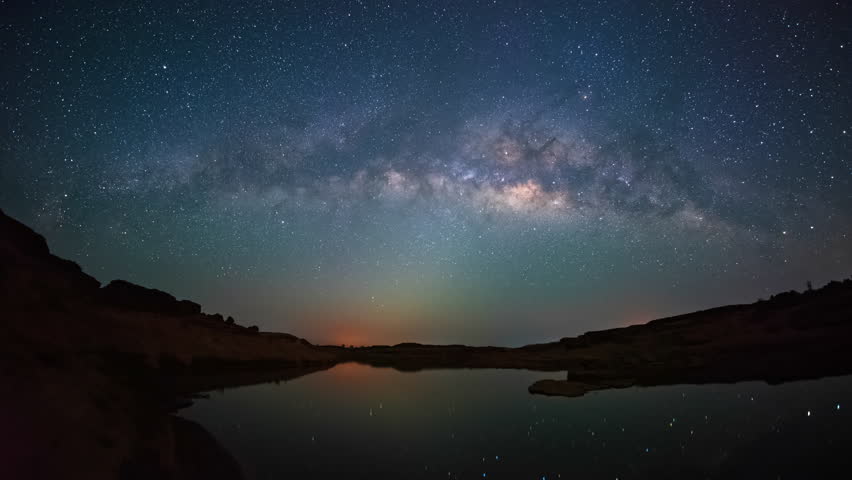 4K Time lapse of milky way and sunrise over Sam Pan Bok canyon, Ubon ratchathani, Thailand Fish-eye version 
