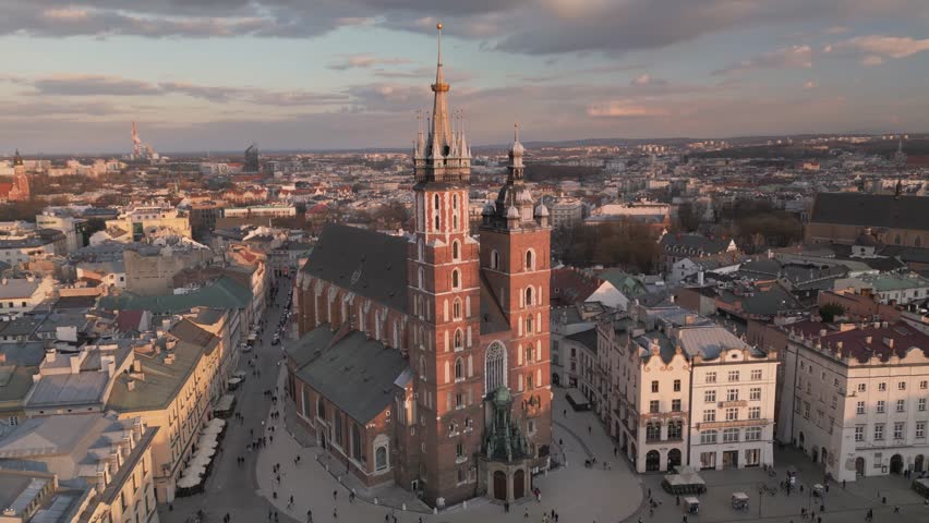 Krakow Main Market Square aerial view during sunset filmed by a drone. Saint Mary