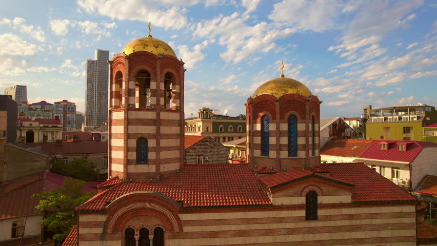 Soar above the mesmerizing Church of St. Nicholas in Batumi, Georgia, and admire its intricate details and stunning architecture. This a breathtaking drone video you won