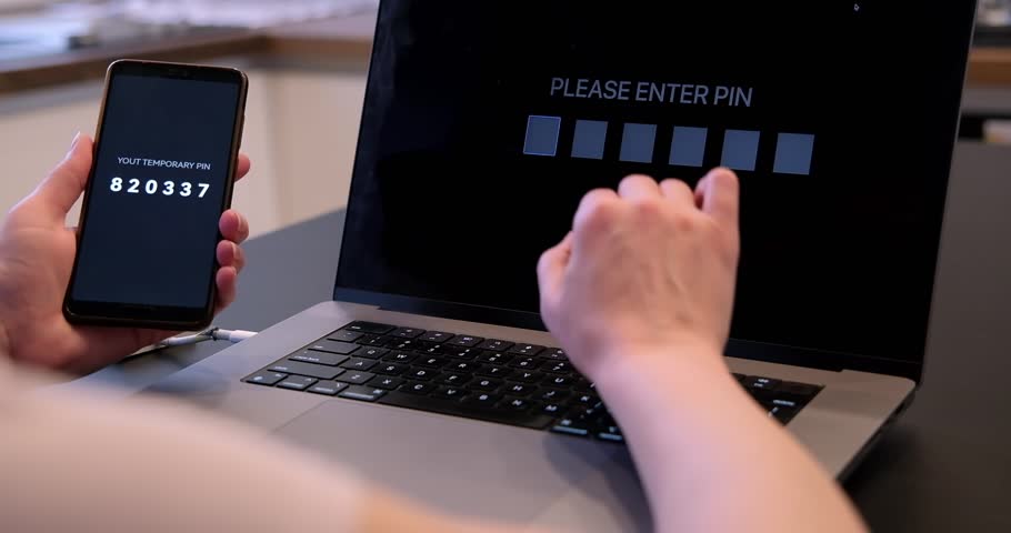 Woman hand enters one time password for verification process, secure mobile one time password verification method, two step authentication web page. Royalty-Free Stock Footage #1101860901