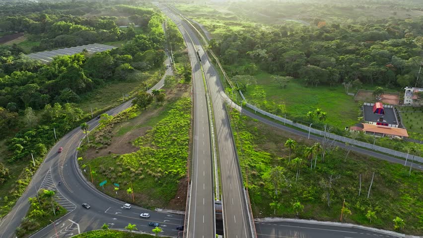 Santo Domingo highway and Monte Plata junction, Dominican Republic. Aerial backward