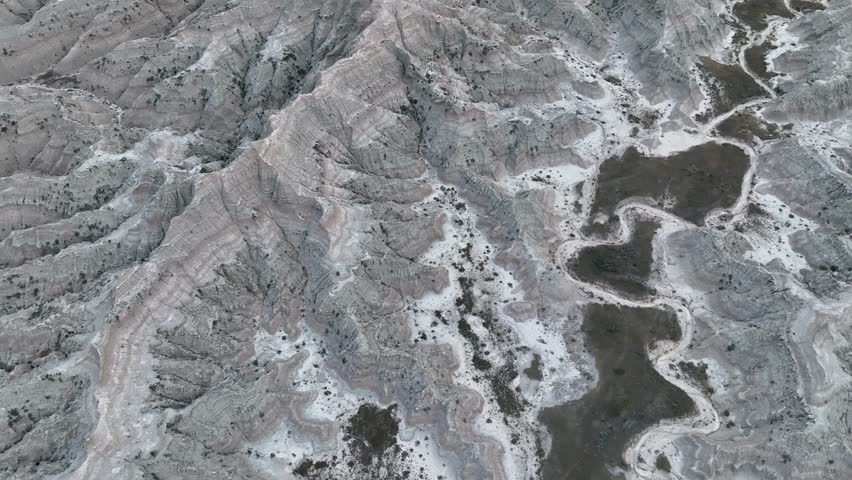 Orbiting aerial view of Badlands National Park in South Dakota.