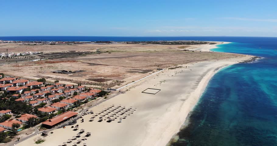 Panning left drone shot of the southern tip of beautiful Sal Island Cape Verde showing the hotels and beaches