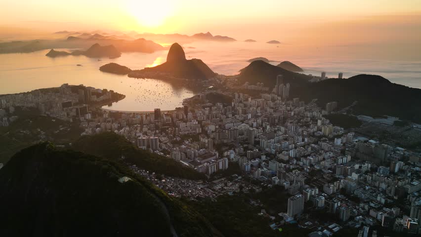 View of Rio de Janeiro With the Sugarloaf Mountain and Botafogo Beach on Golden Sunrise Royalty-Free Stock Footage #1101873269