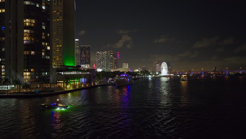 Night urban landscape of downtown district of Miami Brickell in Florida, USA. Skyline with brightly illuminated high skyscraper buildings in modern american megapolis