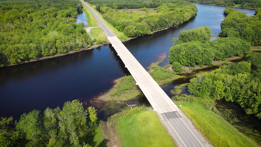 Flying over a river and forest in Northern Minnesota near the border of Canada