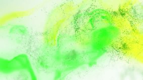 Green yellow Fluid particles ink colors dropped in water mixing effect background ,trendy marble  particularly glittery effect in slow motion backdrop , blank abstract wallpaper for texts and logos 4k