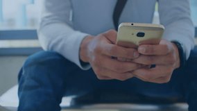Animation of clouds and digital icons over man using smartphone. global communication, technology, social media and digital interface concept digitally generated video. - Powered by Shutterstock - Get 15% off with code: PIKWIZARD15
