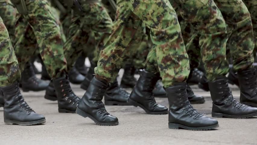 Army soldiers March Military Parade foot uniform camouflage and black boots marching in formation Royalty-Free Stock Footage #1101880531