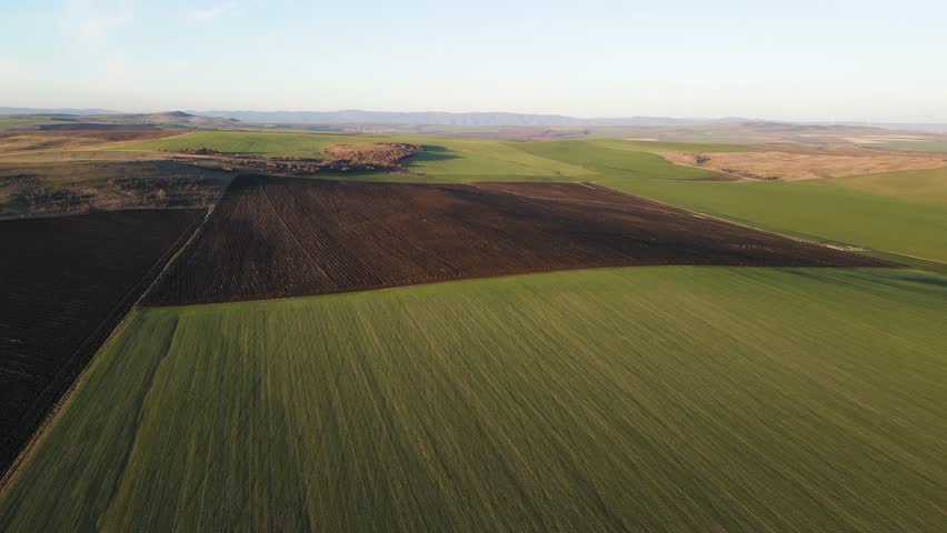Aerial Sunset view of Rural land near Trakia (A1) motorway, Burgas Region, Bulgaria
 | Shutterstock HD Video #1101883355