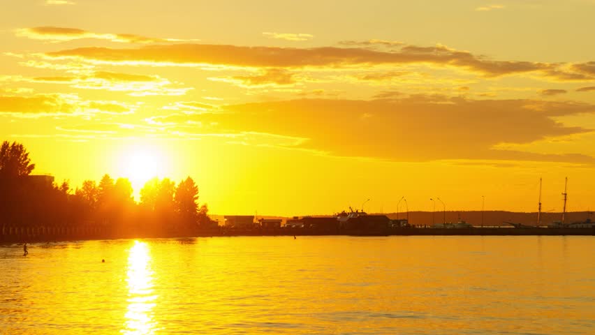 Hot summer landscape timelapse on lake embankment and docks of city | Shutterstock HD Video #1101883805
