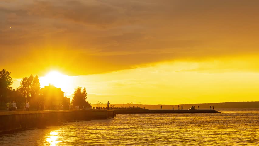 Summer timelapse of sunset on city lakeside embankment with people and tourists | Shutterstock HD Video #1101883821
