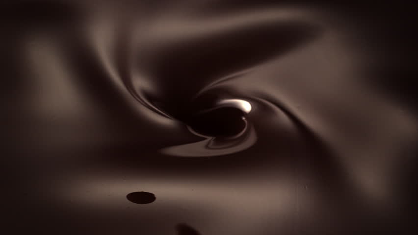 cherries pouring into dark chocolate ice cream