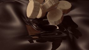 banana slices pouring into dark chocolate ice cream - Powered by Shutterstock - Get 15% off with code: PIKWIZARD15