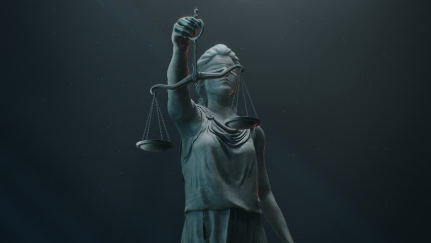 A Title Sequence for Court Show Mock-up. Cinematic and Atmospheric Shot of Lady Justice Sculpture in Dramatic Light. The Statue is Blindfolded and Holding Scales and Sword.
 Royalty-Free Stock Footage #1101891141