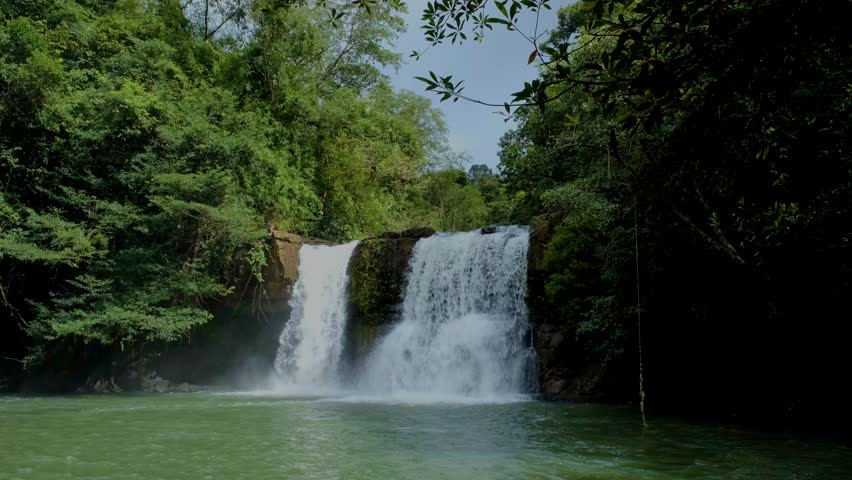 waterfall at the tropical Island of Koh Kood Thailand, a waterfall in a jungle forest in Thailand.  Royalty-Free Stock Footage #1101896435