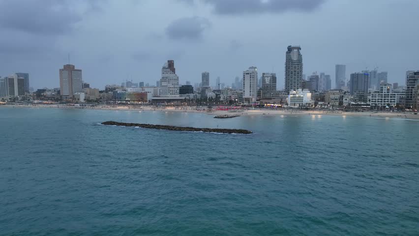 coastline of Tel Aviv , Israel.
modern beach hotels and buildings skyline view, dusk.