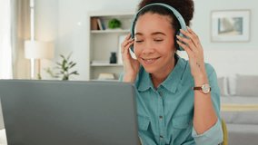 Video call, headphones and laptop of woman in home office working online, virtual communication and writing for website management career. Zoom call, technology and worker typing for a marketing job
