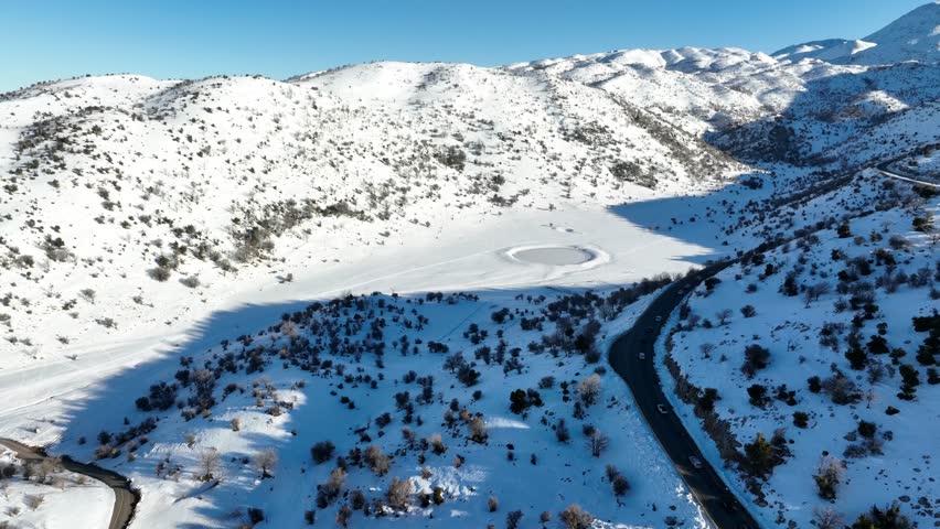 Hermon mountain , frozen lake and snow landscape.