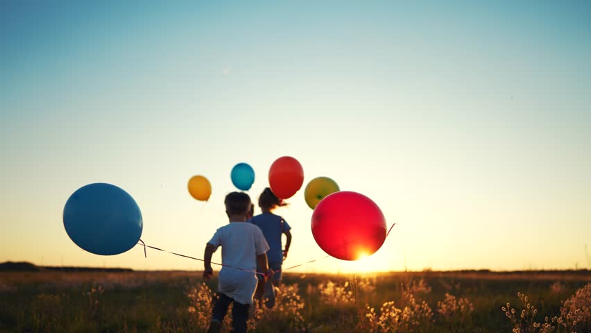 happy family. children kid together run in park with balloons silhouette. people in park. children and son run. happy family and little baby child summer. kid dream concept fun. children run Royalty-Free Stock Footage #1101906473