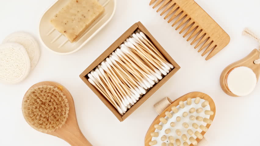 Natural skin care products. Zero waste, eco friendly bathroom and spa accessories. Personal care supplies: wooden comb, brush, toothbrush, soap in handmade. Beauty SPA branding mockup.