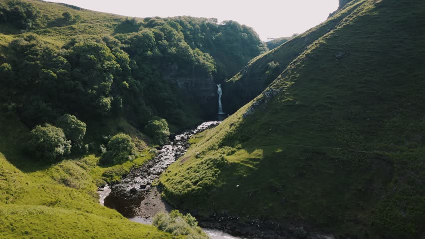 Drone shot approaching Lealt Falls in Scotland