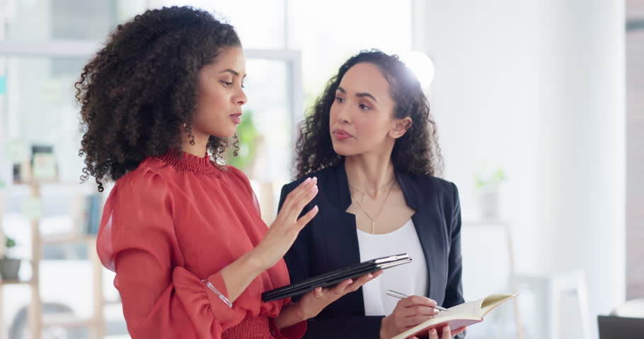 Teamwork, planning and coaching with women in office for discussion, commitment and collaboration. Tablet, notebook and conversation with employees talking for advice, development and meeting | Shutterstock HD Video #1101918141
