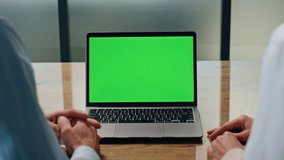 Business team using green screen laptop at lobby closeup. Anonymous coworkers working online on chroma key computer at office interior. Unrecognizable couple making decision with mockup device at desk - Powered by Shutterstock - Get 15% off with code: PIKWIZARD15