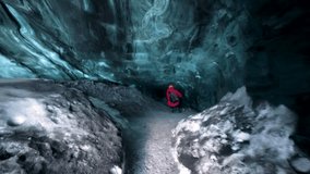 Back View Of A Male Explorer Sitting Inside The Tunnel Of An Ice Cave In Iceland. forward approach - Powered by Shutterstock - Get 15% off with code: PIKWIZARD15