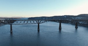 Aerial video of the Hudson River walkway bridge near Poughkeepsie NY over the Hudson River 