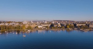 Aerial footage of the Zurich old town where the Limmat river joins lake Zurich in Switzerland largest city. aerial view drone of Zurich city.